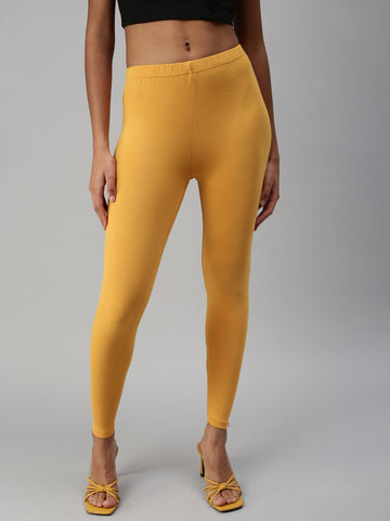 Buy online Yellow Solid Solid Ankle Length Leggings from Capris & Leggings  for Women by Mad Colors for ₹399 at 60% off