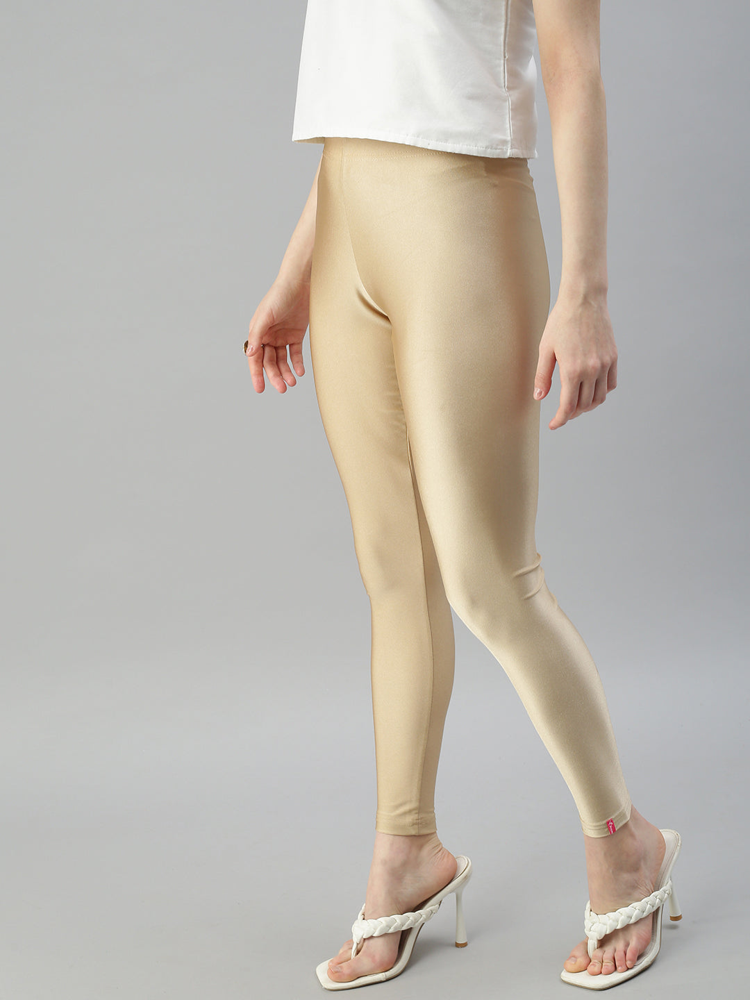 Women Solid Bright Gold Slim Fit Shimmer Leggings – Cherrypick